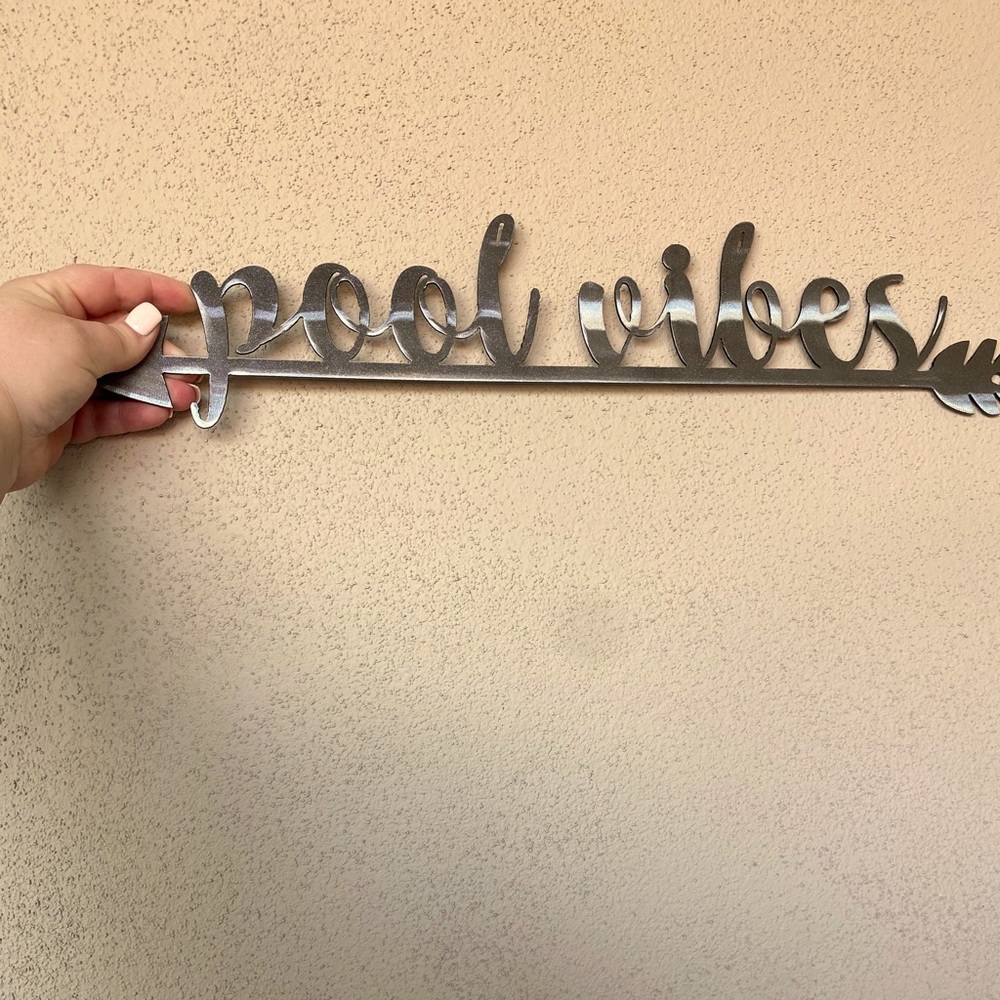 “Pool vibes” metal cut-out sign